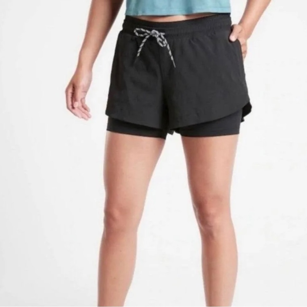 Athleta size 4 woman’s black 2 in 1 athletic shorts with drawstring - Picture 1 of 6